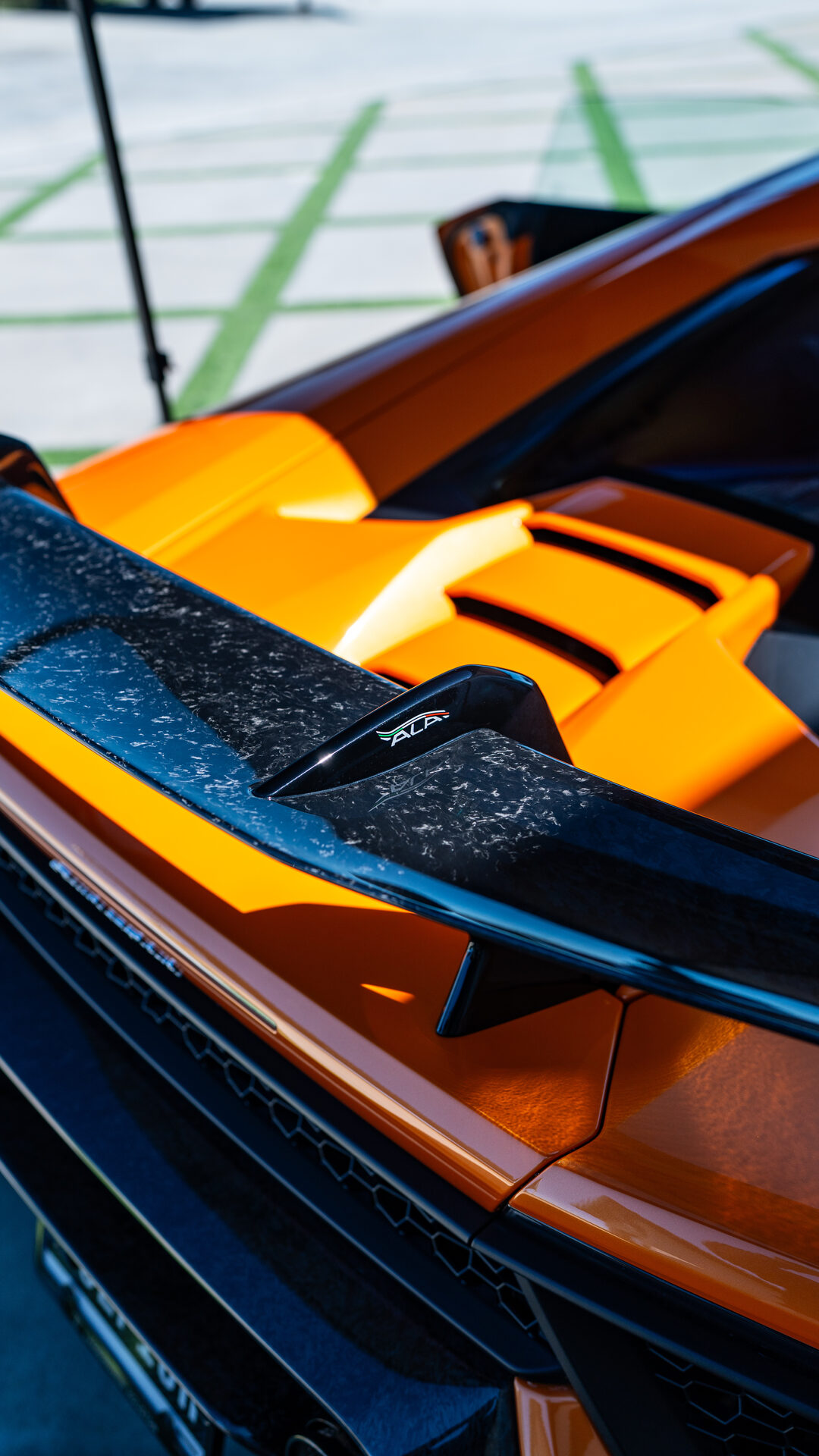Close detail work on an exotic car hood